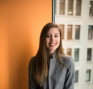 shallow focus photo of woman in gray jacket